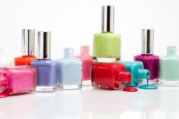 Selection of colourful nail polish bottles representing changes in EU regulations on gel nail products