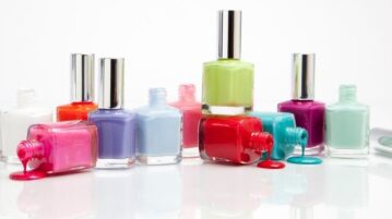 Selection of colourful nail polish bottles representing changes in EU regulations on gel nail products