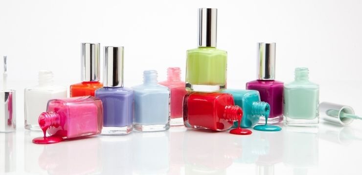 Selection of colourful nail polish bottles representing changes in EU regulations on gel nail products